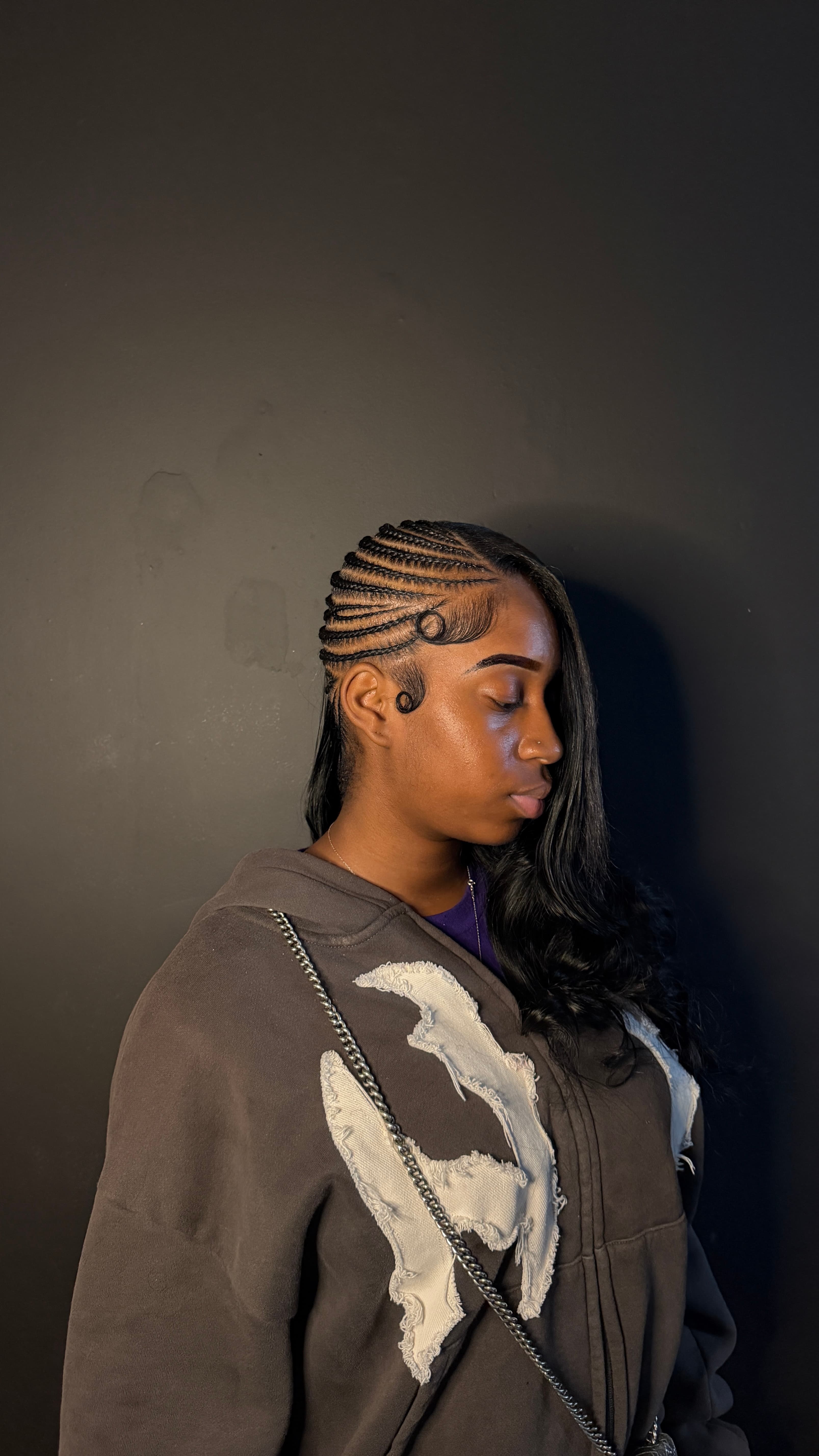 Knotless braids styled by Iriee Beauty