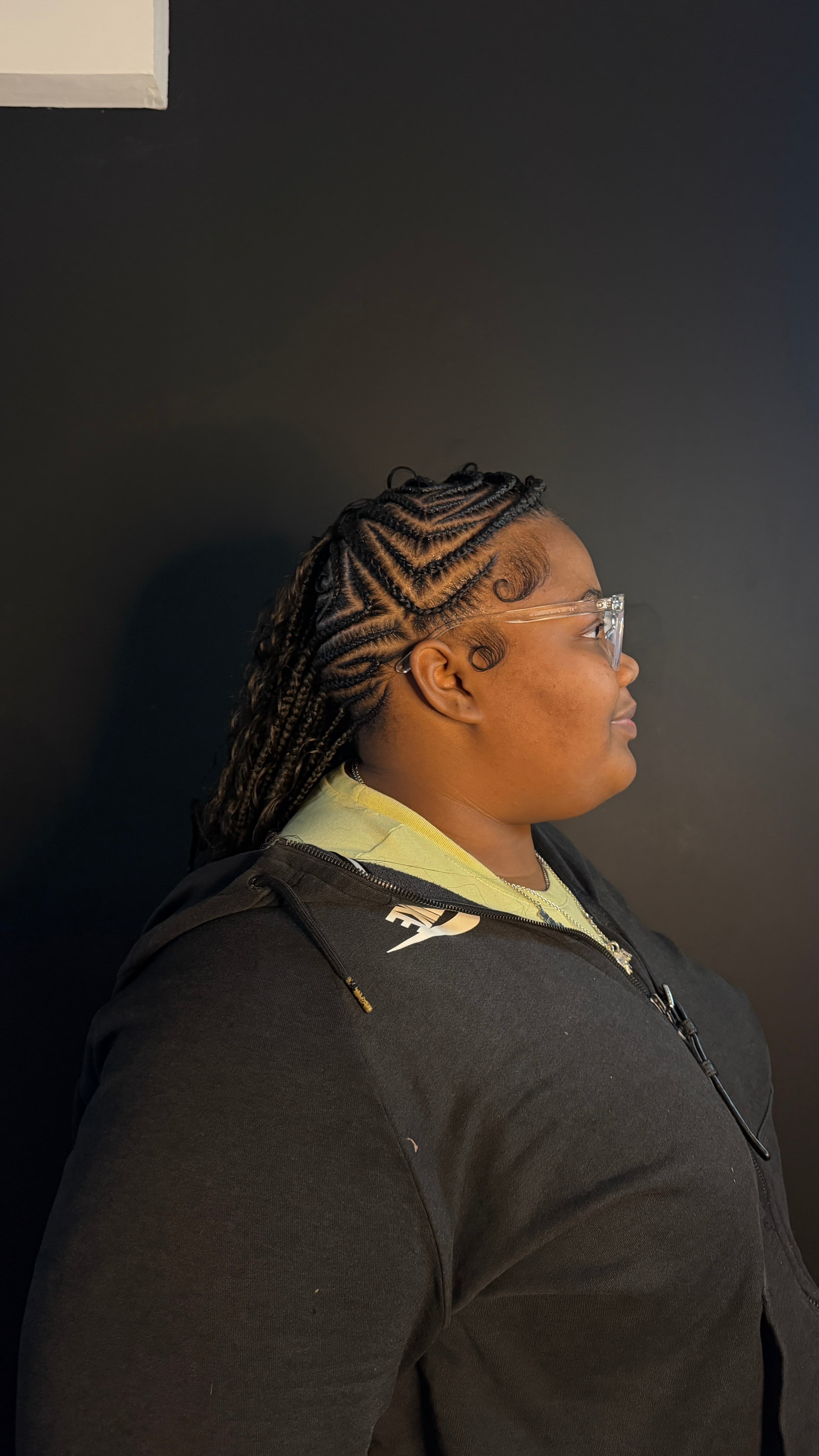 Chevron-part braids styled by Iriee Beauty